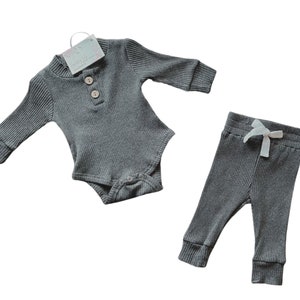 Newborn gender neutral take home outfit. dark grey ribbed clothing henley bodysuit and pants. Sassy Jo's Babies and Bows.