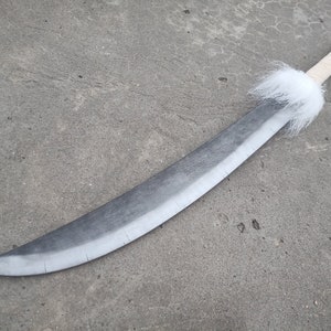 May include: A curved silver sword with a white fur pommel and a red tip.