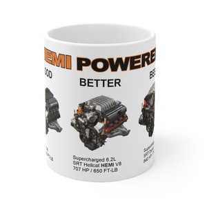 May include: White ceramic mug with a black and orange graphic of a car engine. The text "HEMI POWERED" is in orange and black. The text "BETTER" is in black. The text "Supercharged 6.2L SRT Hellcat HEMI V8 707 HP / 650 FT-LB" is in black.
