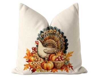 May include: A square off-white throw pillow featuring a central watercolor illustration of a turkey with a fanned tail, surrounded by orange pumpkins, clusters of grapes, and autumn leaves in shades of red, orange, and yellow on a woven fabric.