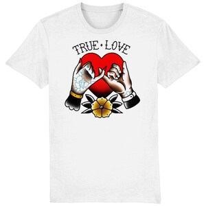 May include: White t-shirt with a red heart and two hands making a pinky promise. The text "TRUE LOVE" is above the heart.
