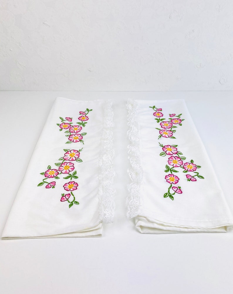 Pair Of Vintage Dark Pink Embroidered Flowers Pillowcases With Lace EdgesEmbroidered Dark Pink Flower PillowcasesPink Flower pillowcases