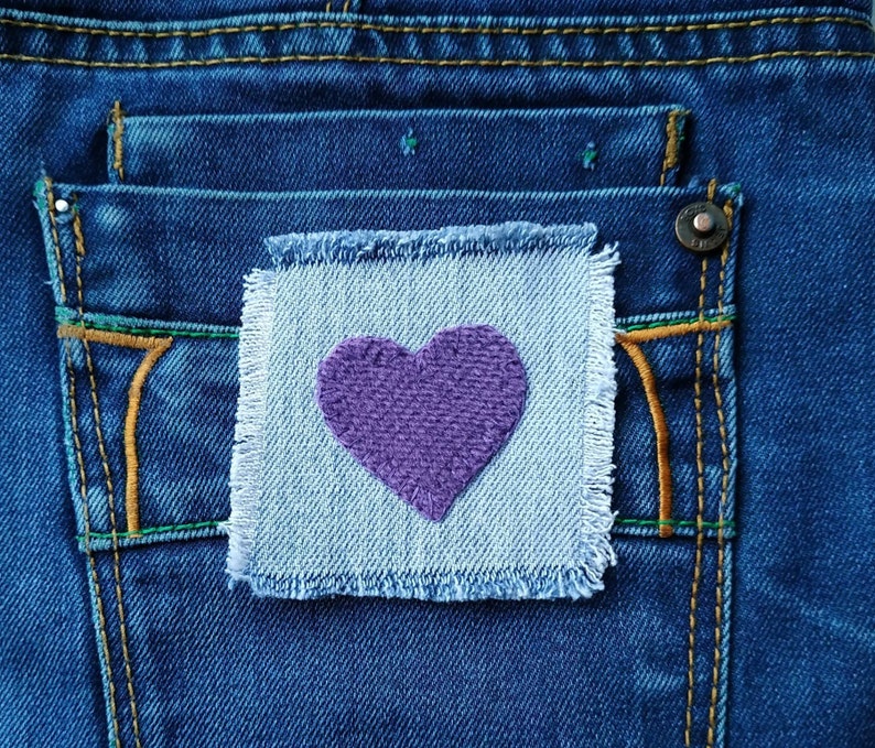 sewing patches on jean jacket