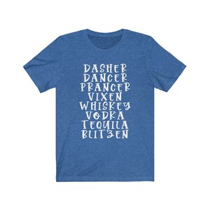 May include: Blue t-shirt with white text listing the names of Santa's reindeer, followed by alcoholic beverages. The text includes "Dasher, Dancer, Prancer, Vixen, Whiskey, Vodka, Tequila, Blitzen."