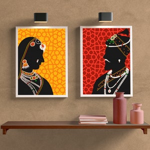 May include: Two framed silhouette portraits of a couple against a patterned background. The woman's portrait is on a yellow background with a geometric pattern. The man's portrait is on a red background with a geometric pattern.