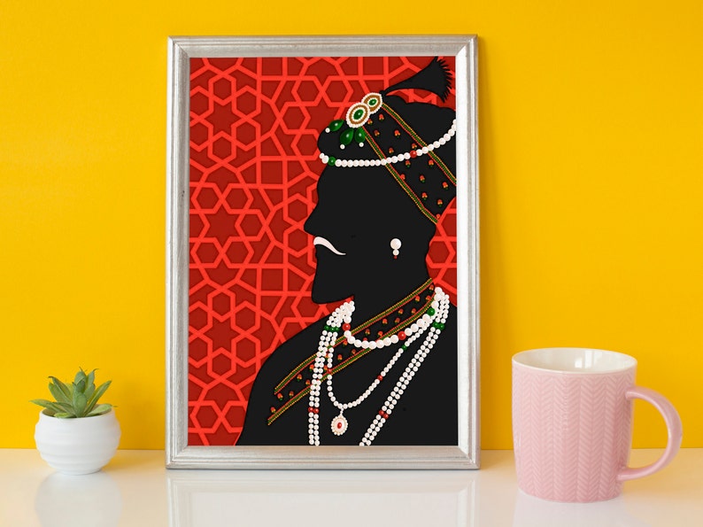 May include: A framed silhouette print of a person wearing a turban and jewelry against a red background with a geometric pattern.