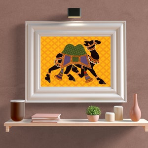 May include: A framed print of a black camel with a green and blue saddle, walking on a yellow background with a repeating pattern.