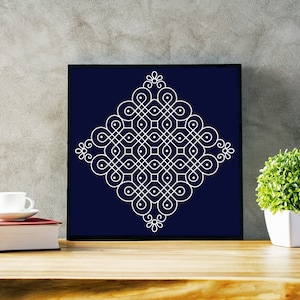 May include: A white geometric design on a dark blue background. The design is a square with a pattern of circles and lines. The design is framed in a black frame.
