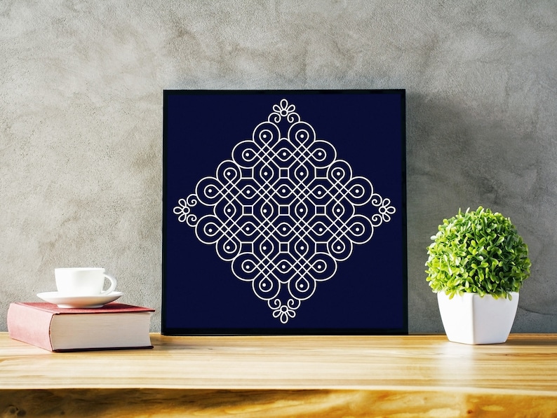 May include: A white geometric design on a dark blue background. The design is a square with a pattern of circles and lines. The design is framed in a black frame.