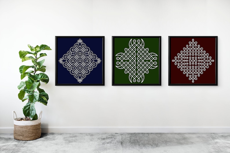 May include: Three framed prints with white geometric designs on different colored backgrounds. The left print has a navy blue background, the middle print has a dark green background, and the right print has a maroon background.