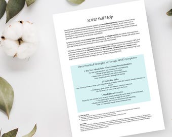 May include: A white printed page titled "ADHD Self-Help" with text about ADHD symptoms and strategies. The page includes bullet points on managing symptoms, with a light blue background. Decorative leaves and cotton balls are in the background.