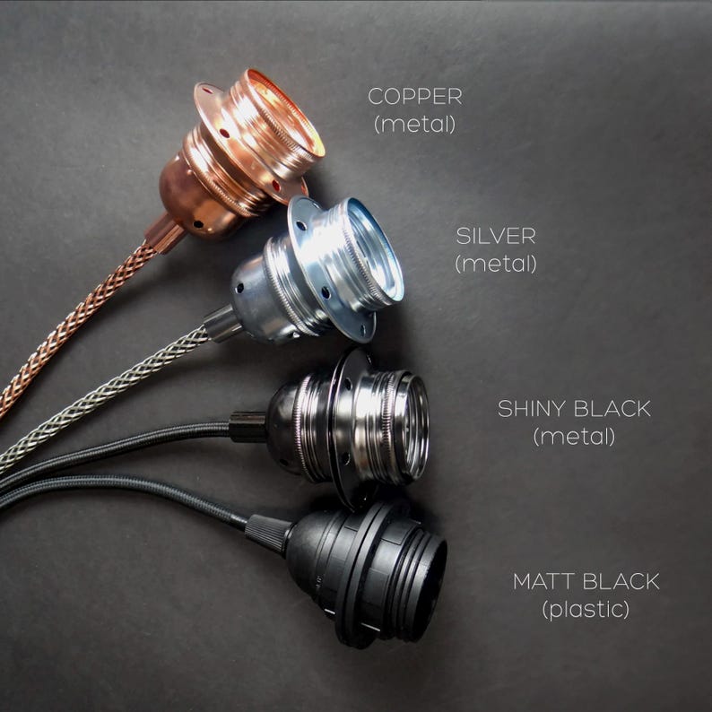 May include: Four different types of lamp sockets: copper, silver, shiny black, and matt black. The copper, silver, and shiny black sockets are made of metal, while the matt black socket is made of plastic.