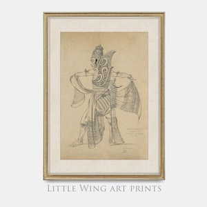 Puede incluir: Un dibujo en blanco y negro de una persona con un traje tradicional balinés, con intrincados detalles en la ropa y el tocado. El dibujo está enmarcado en un marco dorado y tiene un passe-partout blanco.