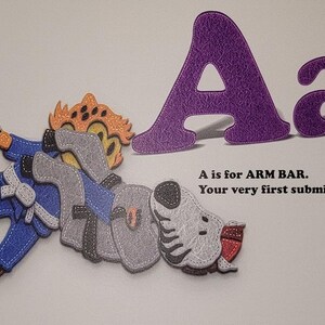 May include: A purple felt letter A with a smaller lowercase a next to it. An illustration of a person in a blue martial arts uniform performing an arm bar submission hold on a gray and white animal. The text reads "A is for ARM BAR. Your very first submission."