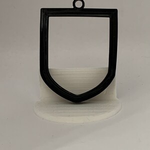 Kilted Shield Shape Flexible Coin Holder
