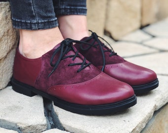 purple saddle shoes