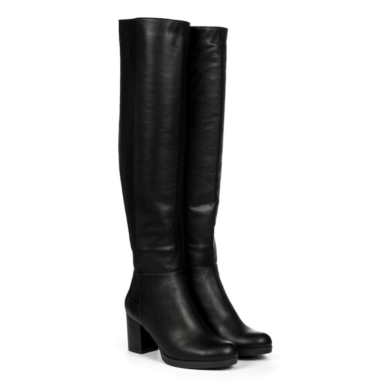 Whether paired with skinny jeans, a chic dress, or a cozy sweater, these boots effortlessly blend style and versatility. Ideal for those who appreciate both fashion and function, these boots are a must-have for your fall and winter wardrobe.