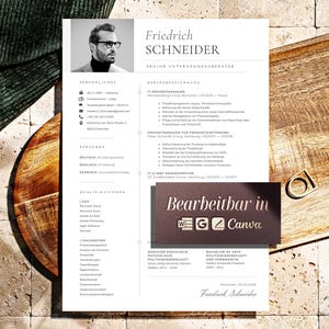 May include: A resume template with the name "Friedrich Schneider" in a minimalist design. The resume includes sections for personal details, languages, qualifications, and experience. The image also shows a wooden tray and a gold ring.