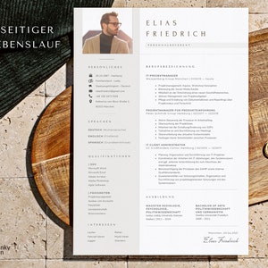May include: A white resume with a black and white photo of a person at the top. The resume is for Elias Friedrich, who is an IT Project Manager. The resume lists his skills, qualifications, and work experience.