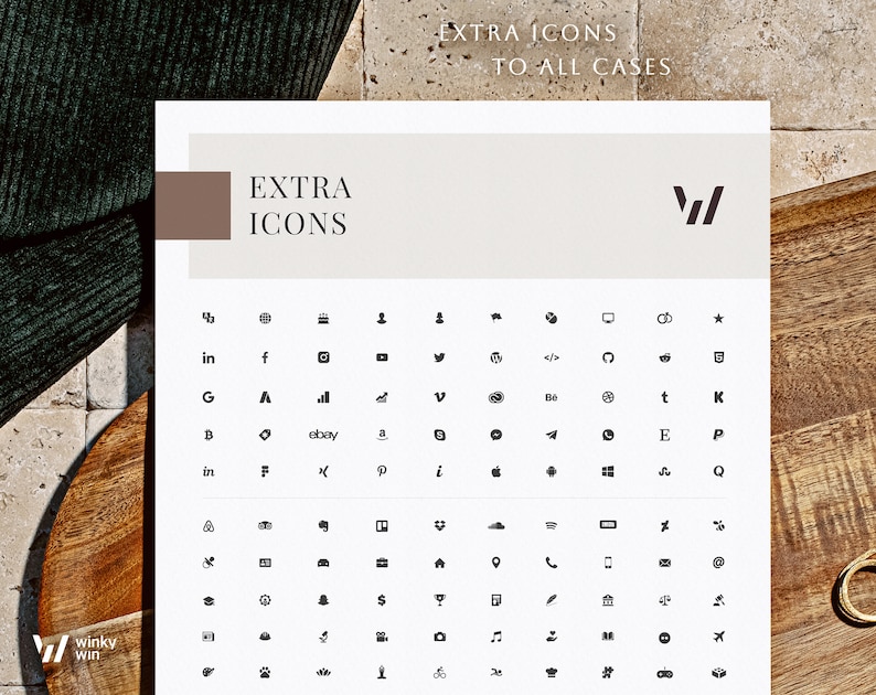 May include: A white sheet with a grid of black icons representing social media platforms, websites, and other symbols. The text "EXTRA ICONS TO ALL CASES" is at the top of the sheet.