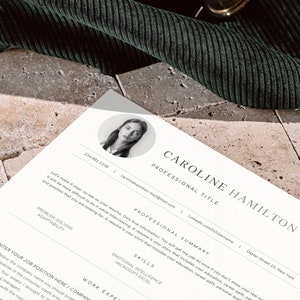 May include: A white resume template with a professional headshot of a woman. The resume includes the title "Caroline Hamilton", contact information, a professional summary, skills, and work experience.