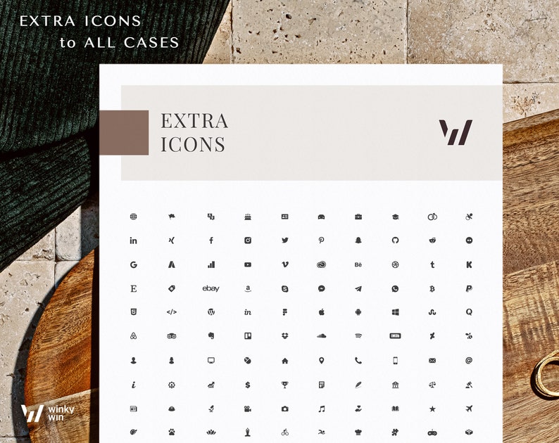May include: A white sheet of paper with a black and white grid of icons. The icons include social media platforms, brands, and symbols. The text "EXTRA ICONS to ALL CASES" is at the top of the sheet. The text "EXTRA ICONS" is in a brown rectangle at the top of the sheet.