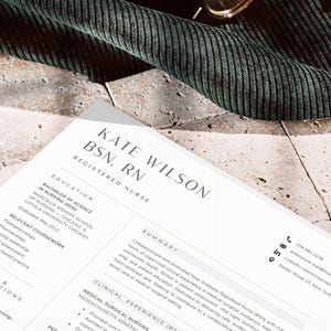 May include: A white resume template for a registered nurse named Kate Wilson, BSN, RN. The document features sections for education, relevant coursework, licenses, certifications, summary, and clinical experience, with contact icons and text.