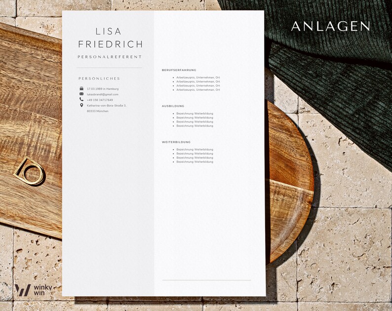 May include: A minimalist resume template with the name "LISA FRIEDRICH" at the top. The document includes sections for personal details, work experience, education, and further training. The background is a light beige with a wooden tray and a gold ring.