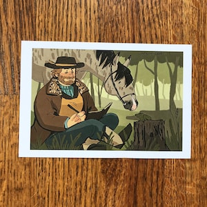 May include: Illustration of a person sketching outdoors with a horse and a frog. The person is wearing a hat, coat, and boots, and is sitting on the ground. The horse is gray and white, and the frog is green. The background is a forest.