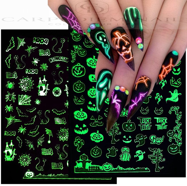 May include: Glow-in-the-dark Halloween nail stickers with images of pumpkins, ghosts, bats, spiders, and the words "Boo!" and "Trick or Treat".