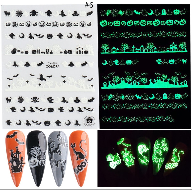 May include: Halloween nail art stickers with glow-in-the-dark designs. The stickers feature various spooky elements like ghosts, bats, pumpkins, and haunted houses. The stickers are shown on a set of nails with different designs.