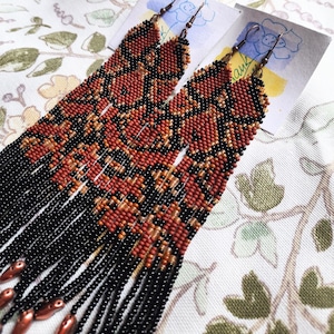 Handmade boho chic earrings with fringe and gold tassel, beaded snake earrings