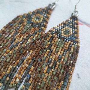 Handmade beaded earrings brown, gray, green.