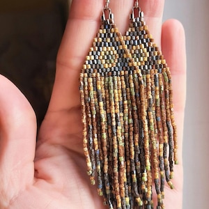 Earrings made of beads upside down in brick weave