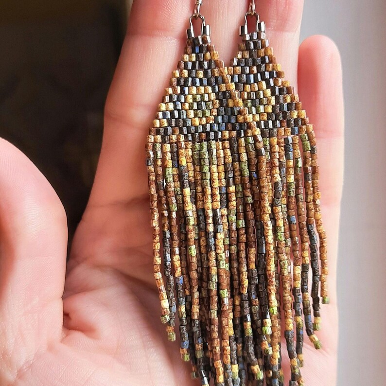 Earrings made of beads upside down in brick weave