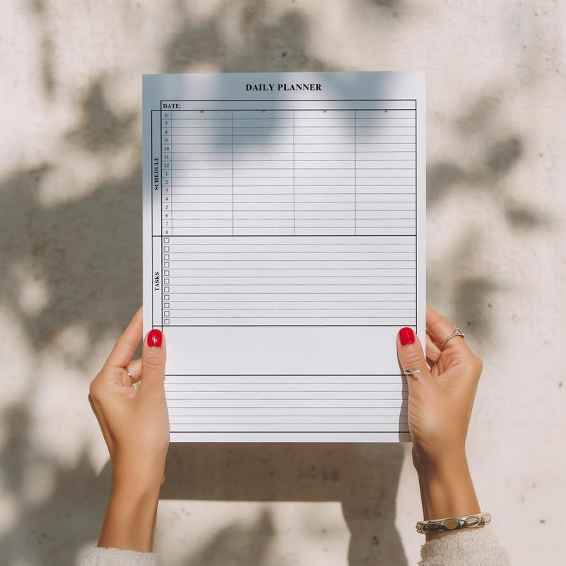 A4 and Letter daily planner PDF mockup with clean layout, designed for professional or personal planning.