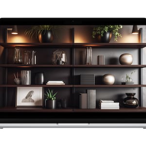 May include: A laptop computer displaying a bookshelf with various decorative items, including plants, vases, books, and sculptures. The bookshelf is made of dark wood and has four shelves. The laptop is silver and has a black screen.