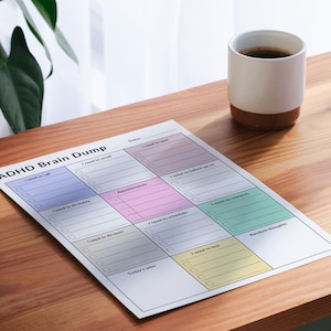 An ADHD brain dump planner printed on a white sheet, with multiple sections like to-do lists, reminders, and space for notes. The sheet is placed on a light, neutral background, offering a clear view of the layout.
