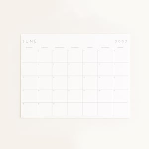 June 2027 printable monthly planner displayed on a soft neutral background in a clean minimalist mockup.