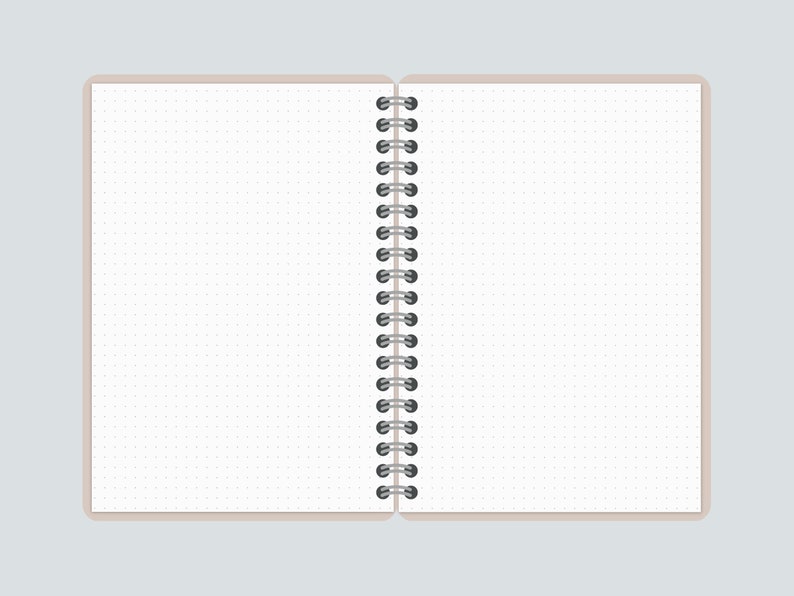 May include: A white notebook with a black spiral binding. The notebook has a dotted grid pattern on the pages.