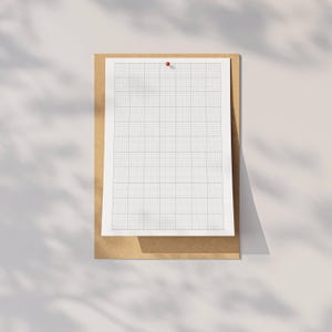 Screenshot of a digital 10x10 graph-paper PDF opened on a computer screen, showing small square grid structure suitable for precise digital writing or drawing.
