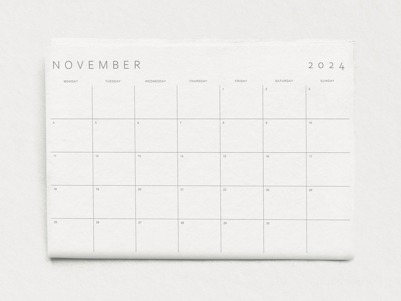 Sleek planner template set against a soft grey background.