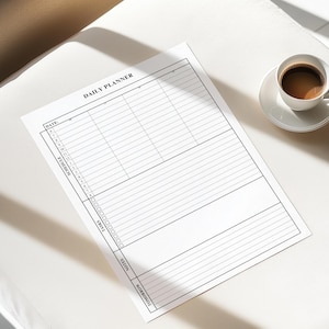 Minimalist digital daily planner PDF on a tablet, perfect for organizing your workday or personal projects.