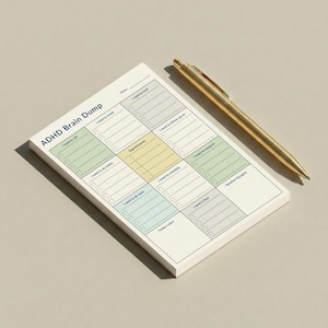 Compact 4x6 inch sticky note pad for ADHD daily planning, with 12 structured sections and pastel headers, resting on a home office desk next to a pen, designed for visual organization and productivity.