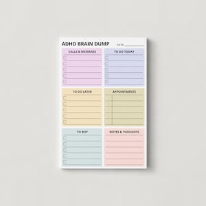 May include: A rectangular ADHD BRAIN DUMP notepad featuring six color-coded sections with headers: CALLS & MESSAGES, TO DO TODAY, TO DO LATER, APPOINTMENTS, TO BUY, and NOTES & THOUGHTS. Each section includes lines and checkboxes for organization.