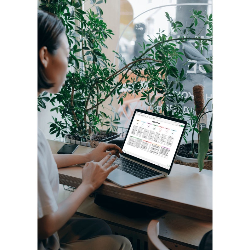 Productivity planner Excel template with customizable weekly layout, featuring a task tracker, daily habit tracker, and to-do list, highlighted by colorful header backgrounds.