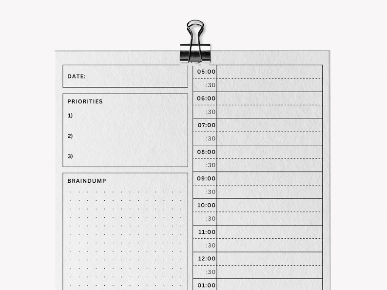 Mockup of a daily planner template displayed in a printable PDF format, designed for timeboxing with clearly defined sections for agenda, schedule, and to-do lists.