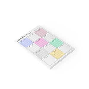 Post-it style ADHD daily checklist pad for adults, featuring shaded visual sections for easy orientation and stress-free planning.