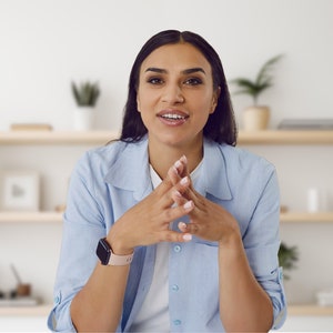 Minimalist virtual background for video meetings, showcasing a modern home office with bookshelves and plants, available as an instant JPG download.