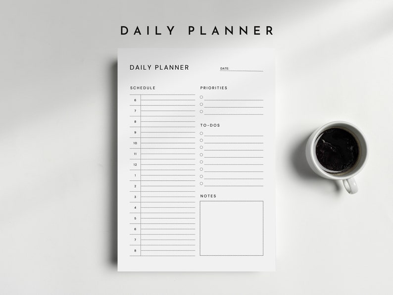 A printable daily planner page printed on white paper, showing sections for schedule, priorities, notes, and to-do list, placed on a clean desk with neutral beige background and minimalist stationery nearby.